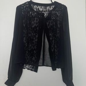 selling a black lace blouse